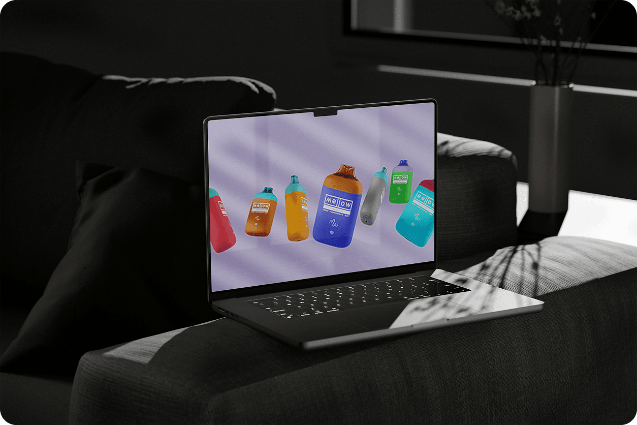 Colorful disposable vape lineup render on laptop, shown on couch