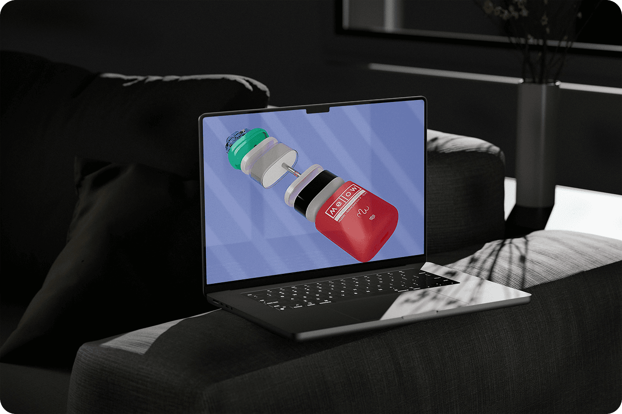 Close-up render of teal, white, and red vape device on laptop