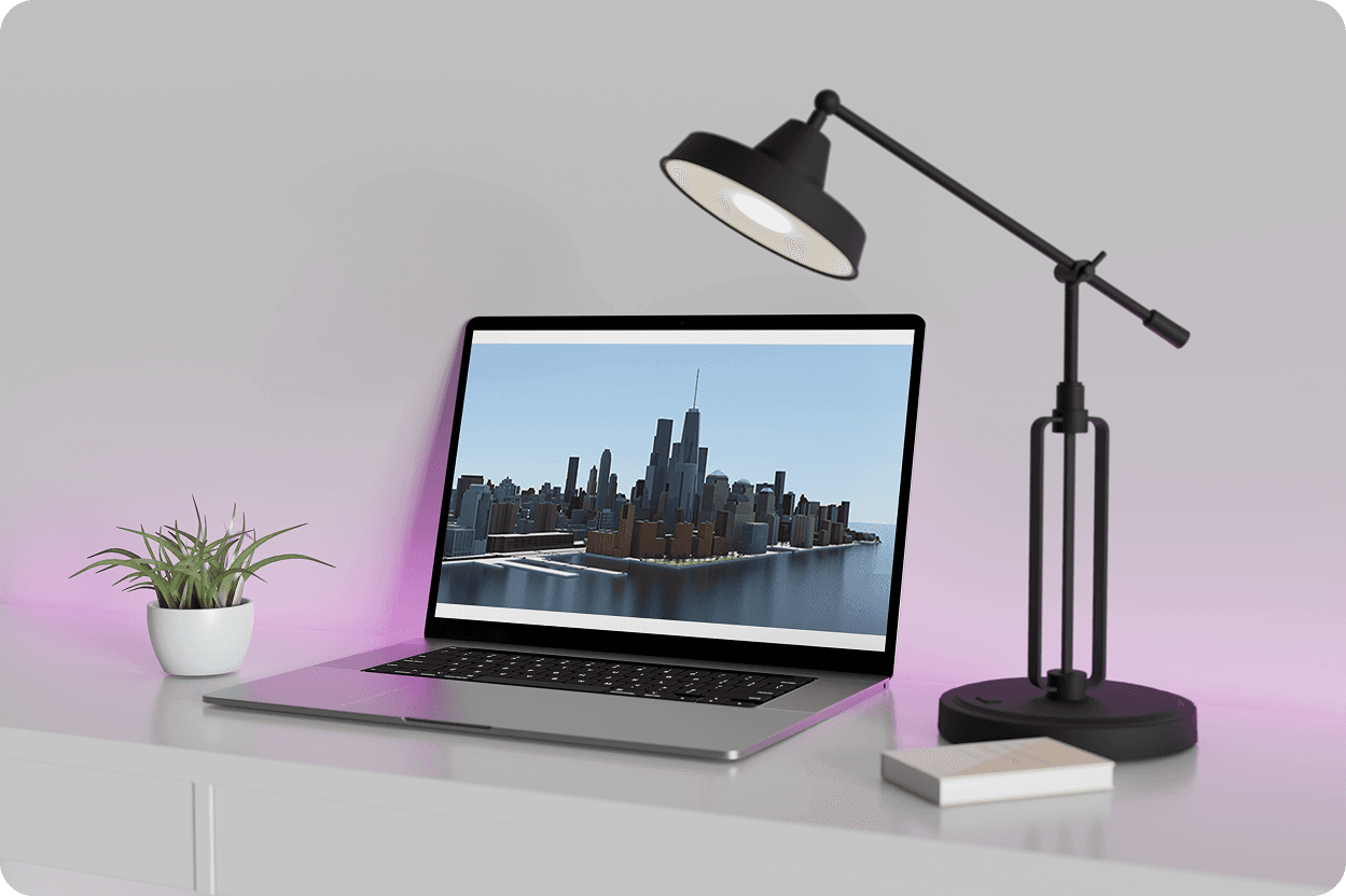 Laptop on shelving beside vases showing detailed 3D urban building scene