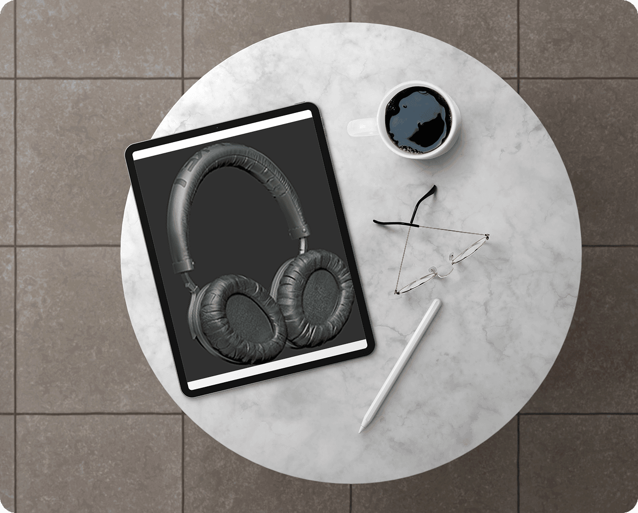 Overhead view of tablet on coffee table displaying 3D headphone model