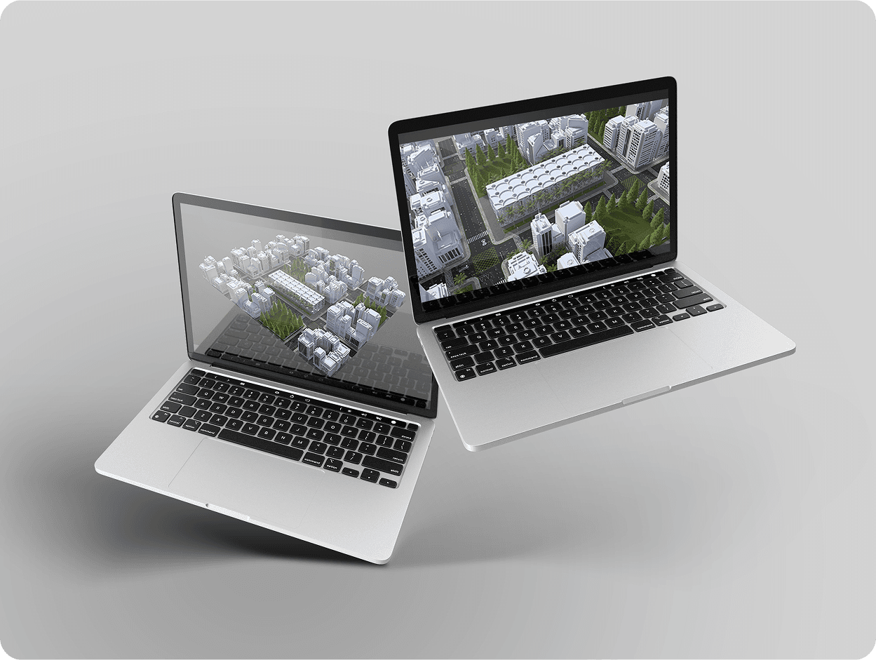 Two floating MacBooks showing aerial 3D city layout render from top
